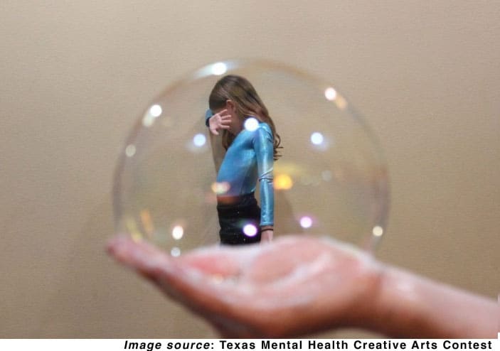 Composite photo of a unidentifiable girl shield her eyes, framed in a bubble held by a hand.