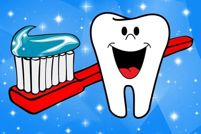 Clip art- drawing of toothbrush and happy tooth